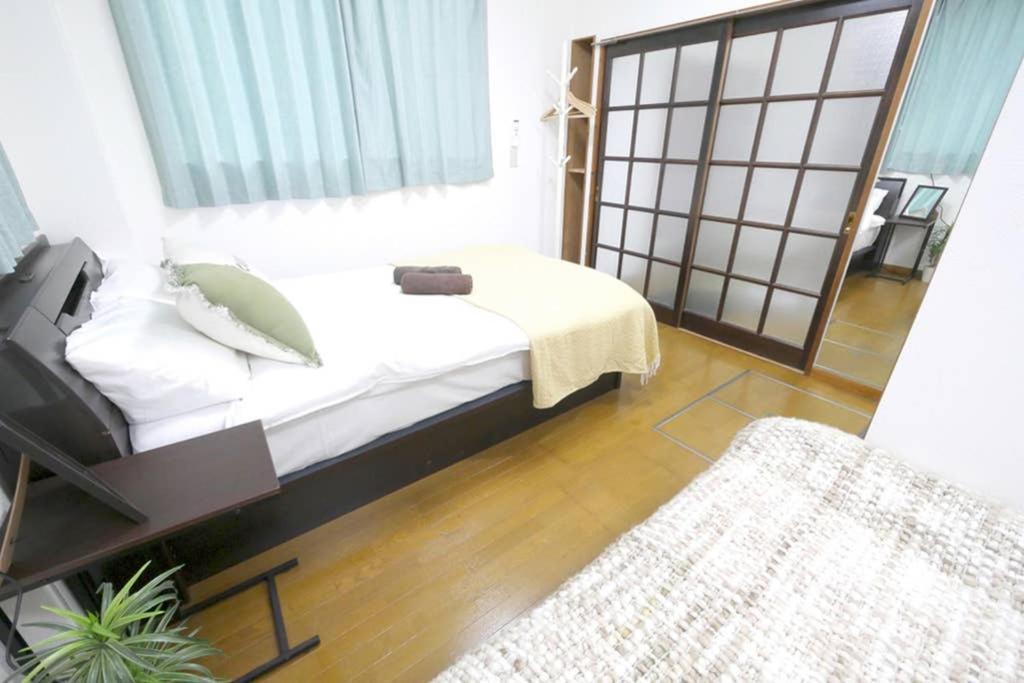 マスク配布ありa5 新宿10分 10人宿泊可能 出張在宅勤務に最適!!宿泊型テレワークスペース!!Wifi完備 回線安定してます!!長期宿泊受付中 Tokyo Exterior photo